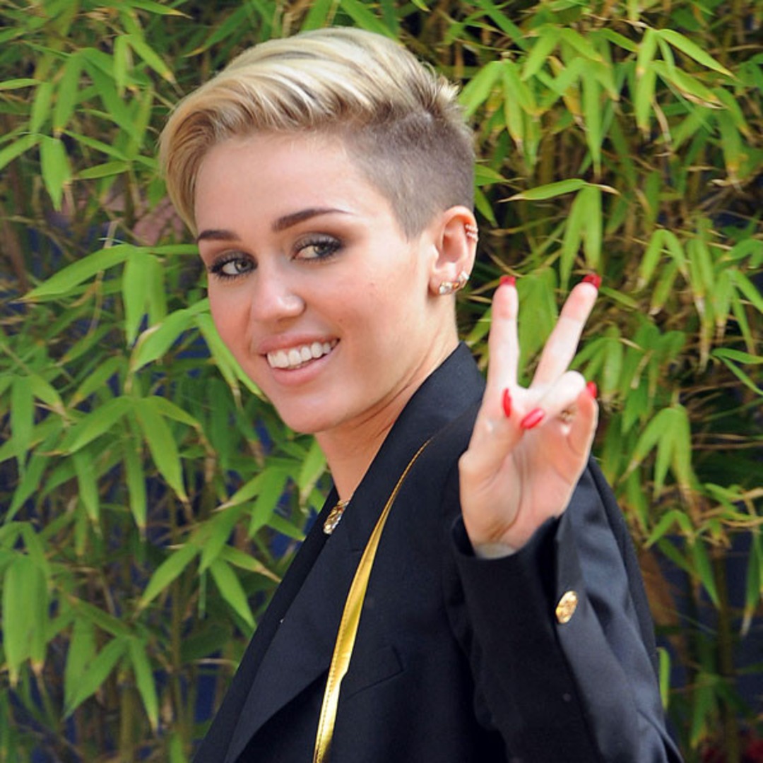 Miley Laments Food Poisoning in Germany - E! Online